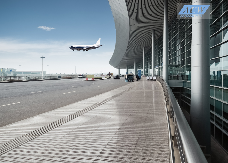 An airport terminal with a plane coming into land in the background and the ACW Personal Cars logo in the top right hand corner.